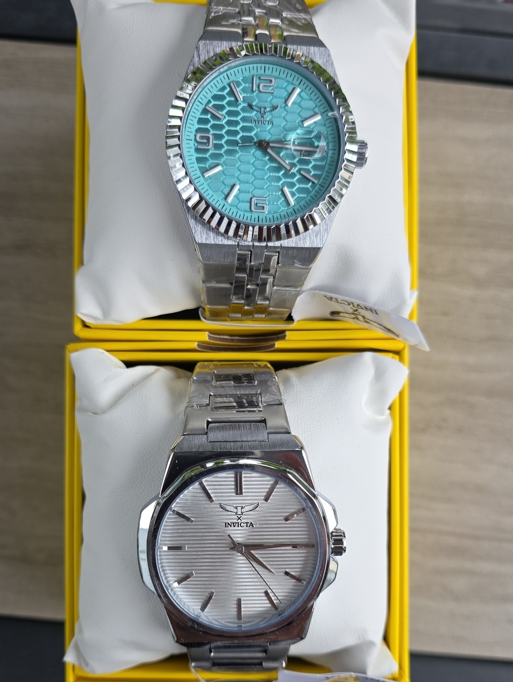 786. Pair Of Men's Invicta Watches